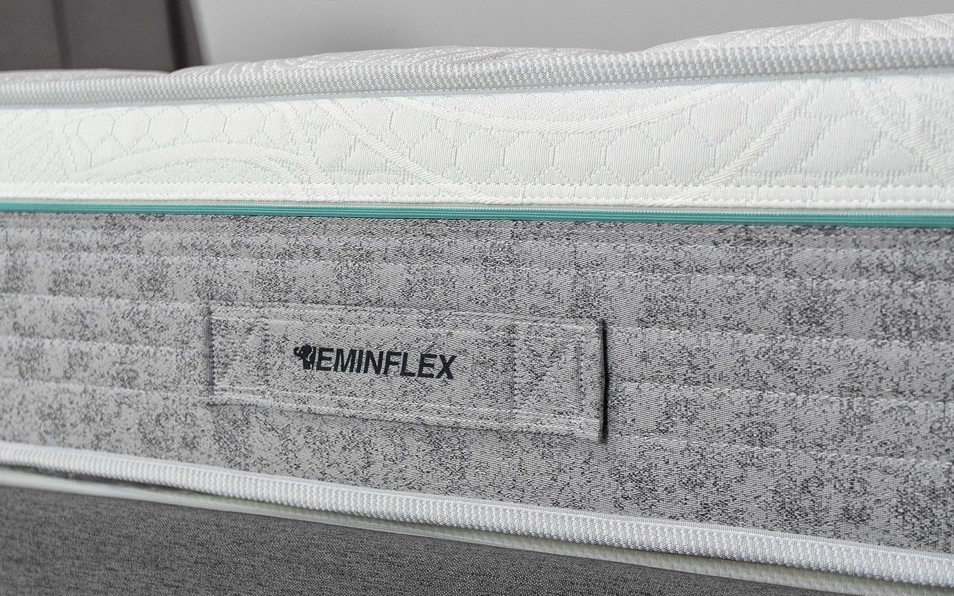 Eminflex Materassi Performa matrimoniale dettaglio fascia con maniglia in tessuto